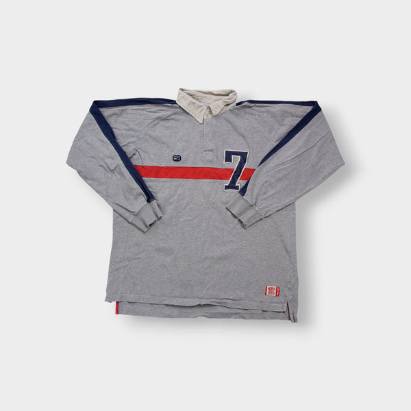 Nike polo shirt in grey and navy featuring a red stripe and number 7 patch