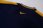 Nike navy and yellow V-neck sweater with yellow sleeve stripes and embroidered swoosh, detail 2