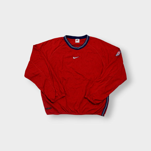 Nike fleece sweater in red with navy striped collar and centered Swoosh logo
