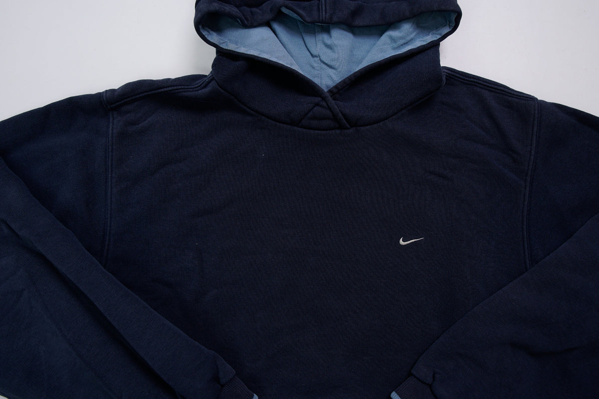Nike hoodie sweater in navy with light blue hood lining and small embroidered Swoosh, full view