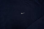 Nike hoodie sweater in navy with light blue hood lining and small embroidered Swoosh, detail