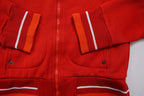 Nike track jacket in red and orange featuring a ring zipper pull and ribbed collar, detail 2