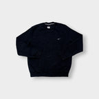 Nike sweater in black with small white embroidered swoosh on left chest