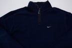 Nike fleece sweater in navy with a half-zip collar and white embroidered Swoosh, full view