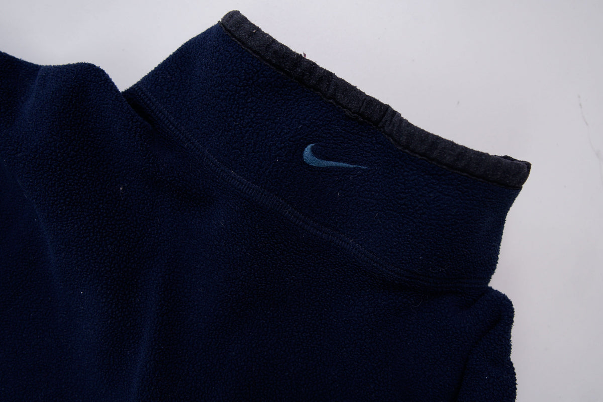 Nike fleece sweater in navy with a half-zip collar and white embroidered Swoosh, detail 3