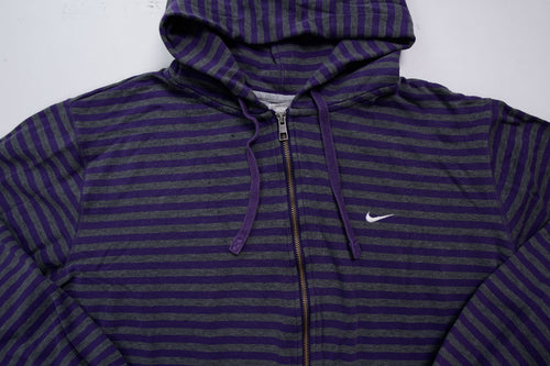 Nike zip jacket in purple and grey stripes featuring an embroidered white Swoosh logo, full view