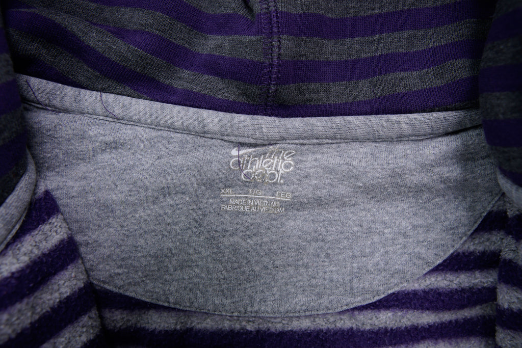 Nike zip jacket in purple and grey stripes featuring an embroidered white Swoosh logo, size label