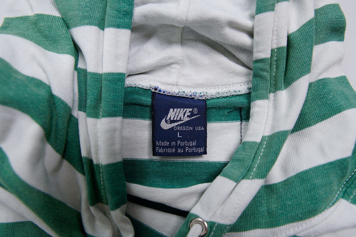 Nike green and white striped hooded sweater with a red rugby print on the chest, size label