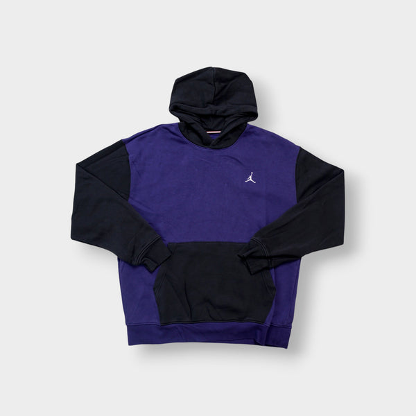 Jordan sweater in purple and black with an embroidered white Jumpman logo