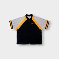 Nike short-sleeve jacket in black and grey with orange stripes and collar detail