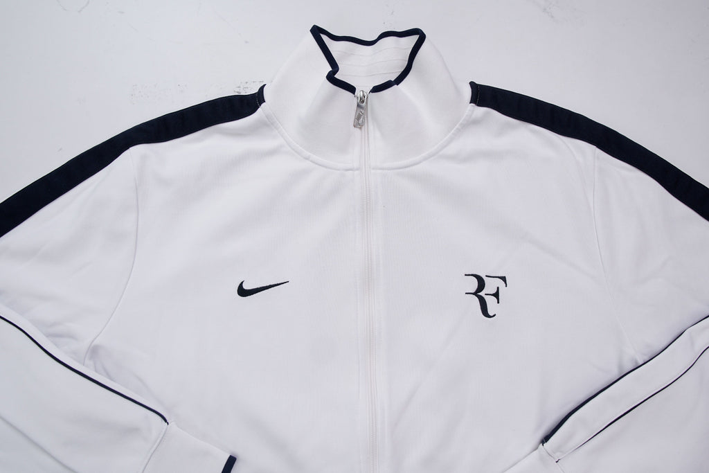 Nike track jacket in white and navy featuring an embroidered RF logo on the chest, full view