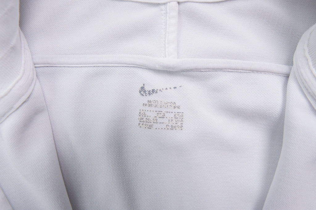 Nike track jacket in white and navy featuring an embroidered RF logo on the chest, size label