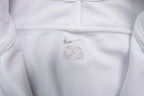 Nike track jacket in white and navy featuring an embroidered RF logo on the chest, size label