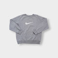 Nike crewneck sweater in grey with a large white embroidered swoosh applique on the chest