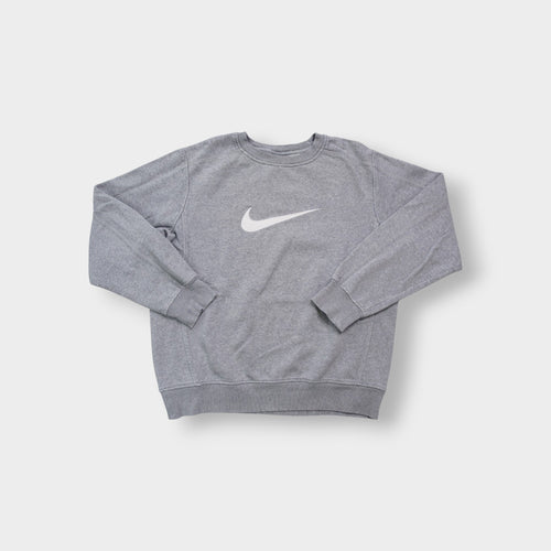Nike crewneck sweater in grey with a large white embroidered swoosh applique on the chest