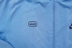 Light blue Nike jacket with red shoulder stripes and embroidered chest logo, detail 2