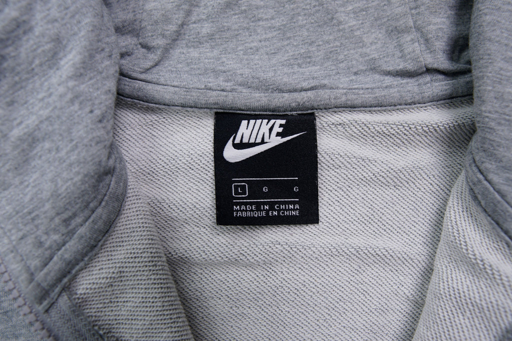Nike zip hoodie in heather grey with white embroidered logo on chest, size label