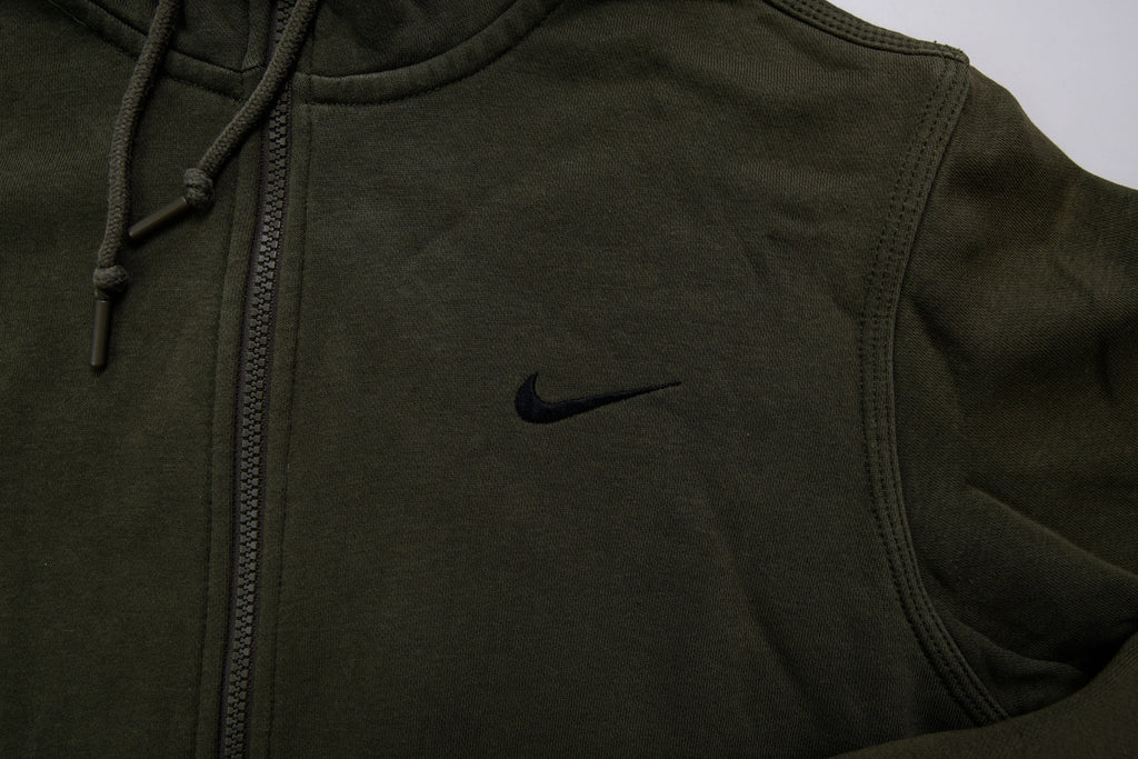 Green Nike zip hoodie jacket with a small black embroidered Swoosh on chest, detail