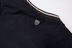 Nike Golf sweater in black with a V-neck collar and a small white embroidered swoosh, detail 2
