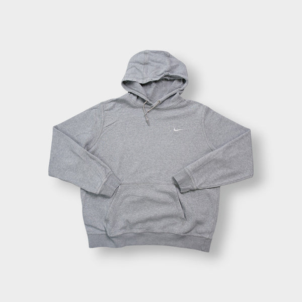 Nike grey hoodie sweater featuring a small white embroidered Swoosh logo on the chest