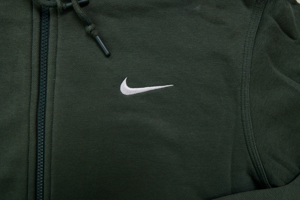 Nike sweater in green featuring an embroidered white Swoosh logo on the chest, detail 2