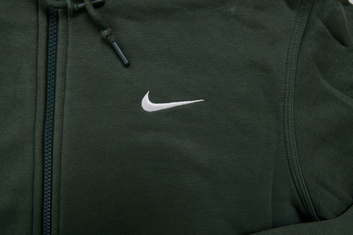 Nike sweater in green featuring an embroidered white Swoosh logo on the chest, detail 2