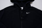 Black Nike zip jacket featuring a hood and embroidered white Swoosh on chest, detail