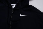 Black Nike zip jacket featuring a hood and embroidered white Swoosh on chest, detail 2