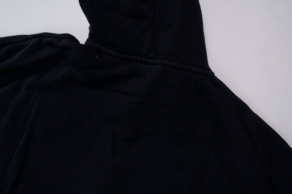 Black Nike zip jacket featuring a hood and embroidered white Swoosh on chest, back view