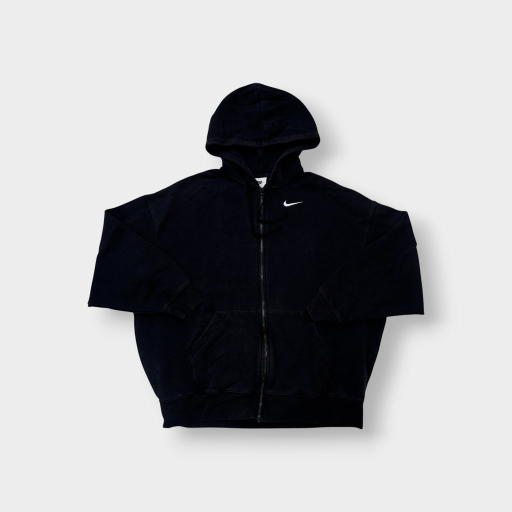 Black Nike zip jacket featuring a hood and embroidered white Swoosh on chest