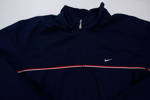 Navy Nike jacket featuring a white embroidered Swoosh logo and a red chest stripe, full view