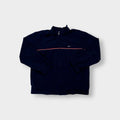 Navy Nike jacket featuring a white embroidered Swoosh logo and a red chest stripe