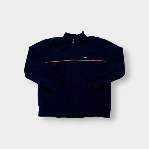 Navy Nike jacket featuring a white embroidered Swoosh logo and a red chest stripe