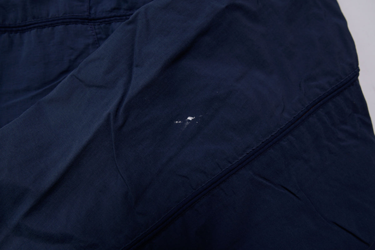 Nike jacket in navy featuring an embroidered orange Swoosh on the chest, detail 2