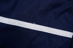 Navy Nike zip-up jacket with white contrast stripes across the chest and sleeves, detail 2