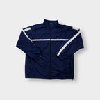 Navy Nike zip-up jacket with white contrast stripes across the chest and sleeves