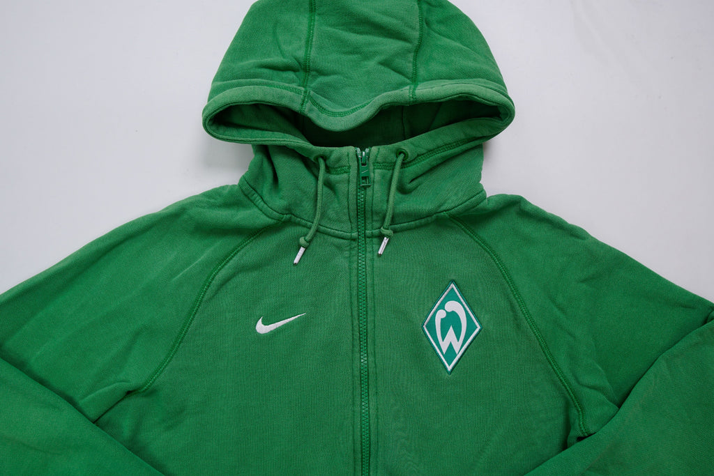 Nike zip hoodie jacket in green with an embroidered Werder Bremen crest on the chest, full view