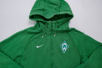 Nike zip hoodie jacket in green with an embroidered Werder Bremen crest on the chest, full view