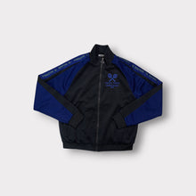 Load image into Gallery viewer, Diadora jacket in black and blue with embroidered tennis racquets on the chest