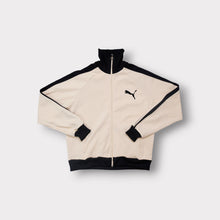 Load image into Gallery viewer, Puma track jacket in beige and black featuring an embroidered cat logo on the chest