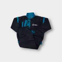 Load image into Gallery viewer, Wera tracksuit in black and teal featuring a front zip and chest embroidery.