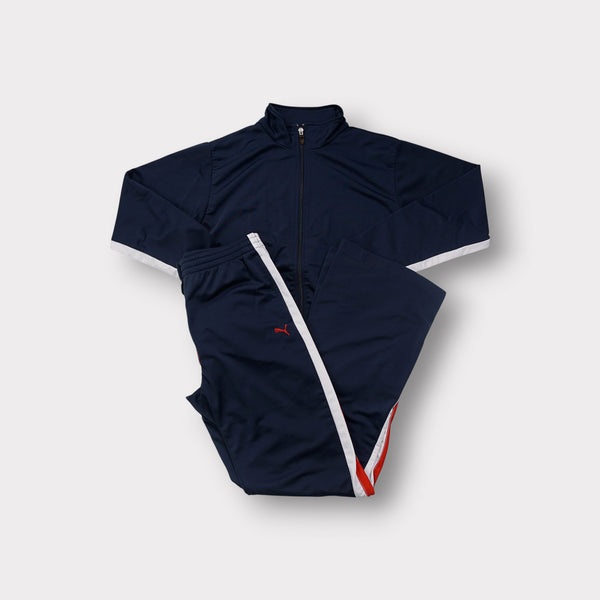 Puma navy blue tracksuit set with red contrast side panels and embroidered cat logo
