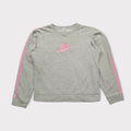 Nike crewneck sweater in grey with pink sleeve stripes and pink embroidered chest logo.